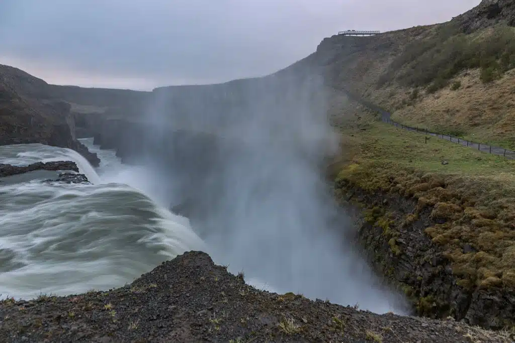 Close-up Photo of Waterfalls Under White Sky